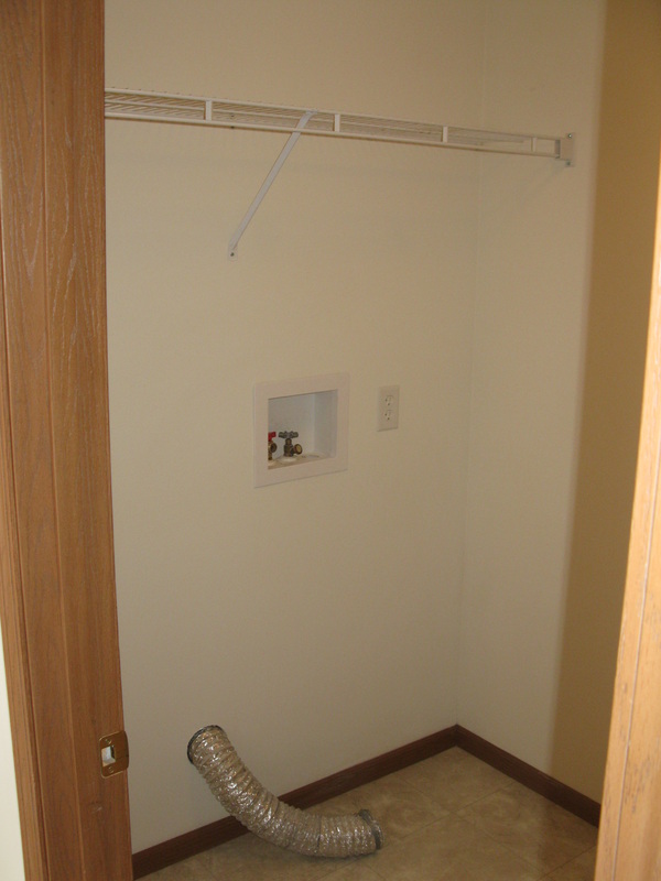 Laundry room in 300 Place Town Home