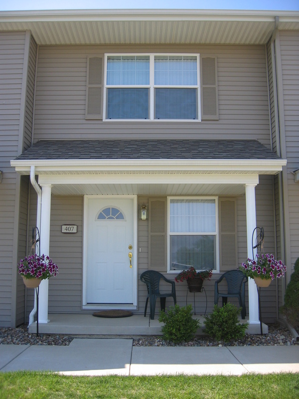 Street view of front door outside 400 Place Town home