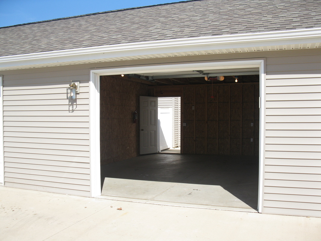 Inside of garage of 400 Place Town home