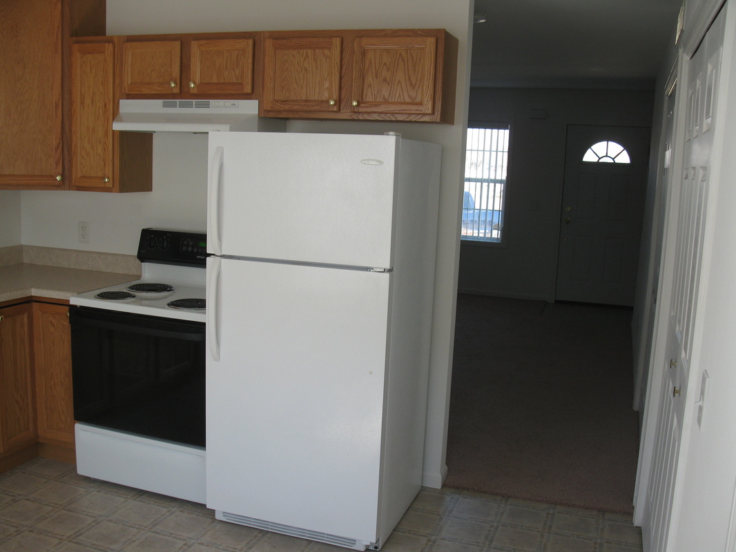 Kitchen in 400 Place Town home looking towards the living room