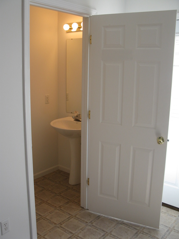 Half bathroom on main floor of 400 Place Town home