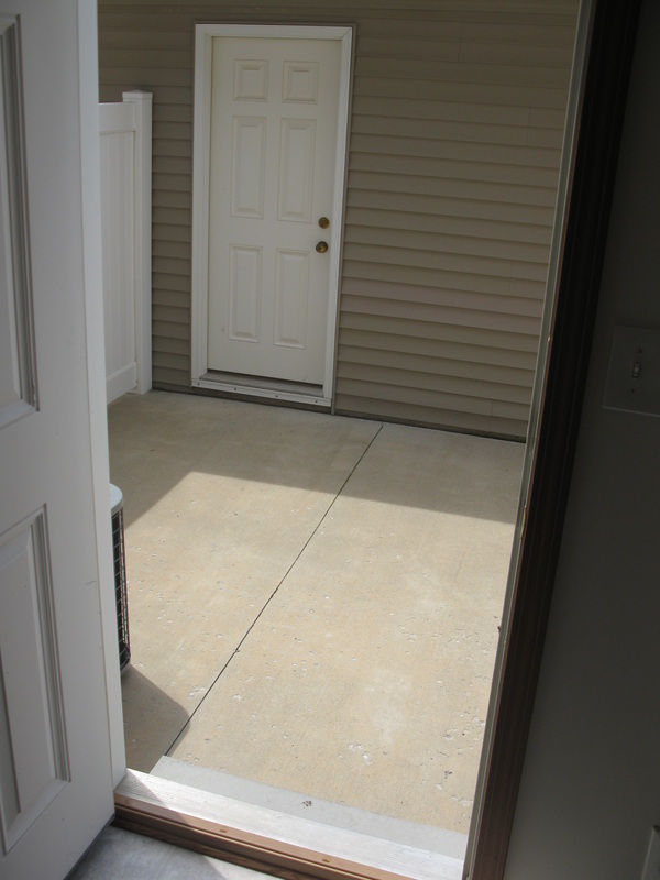 Private patio outside of 500 Place 2 bedroom town home