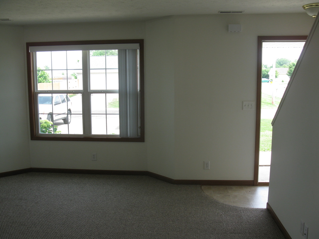 Living Room looking towards the front door in 500 Place 2 bedroom Town home