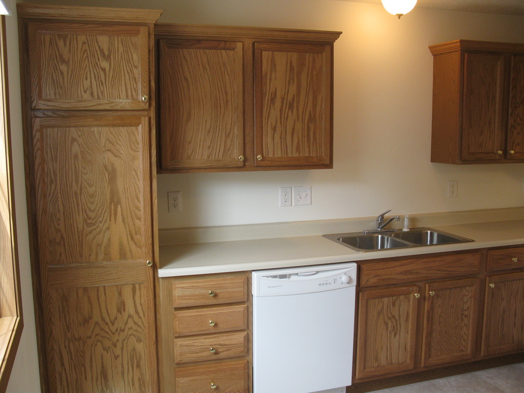 Kitchen dishwasher and sink in 500 Place 2 bedroom Town home