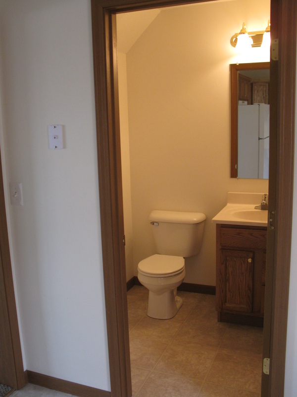 Half bathroom in 500 Place 2 bedroom town home