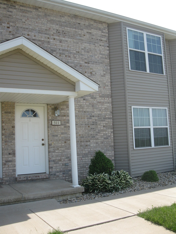 Street view of front door outside 500 Place 3 bedroom town home