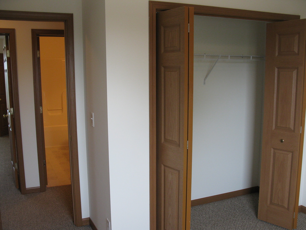 Third bedroom closet in 500 Place 3 bedroom town home