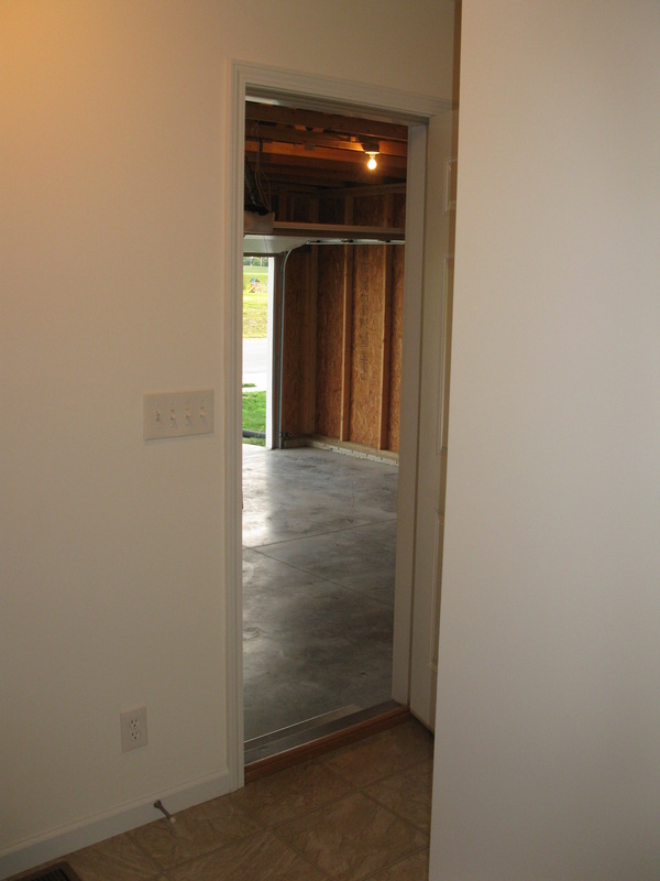 View from the living room into the garage in College Park Duplex