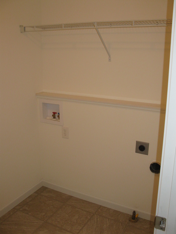 Laundry room in College Park duplex