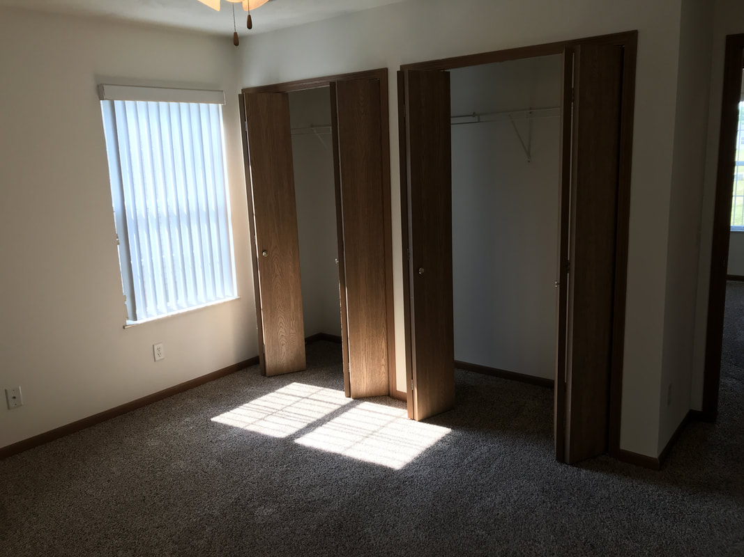 Master bedroom split closet in Parkview B Duplex